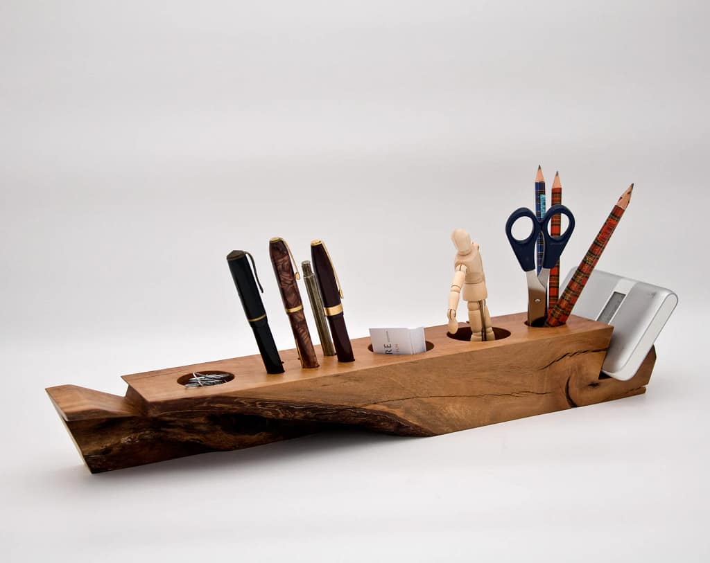 Beautiful wooden desk organizer with compartments for pens, files, and gadgets, giving a natural and elegant look to workspace