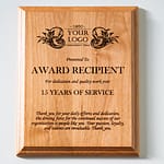 Laser-engraved wooden trophy with polished base and premium award design suitable for corporate and sports recognition.
