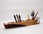 Beautiful wooden desk organizer with compartments for pens, files, and gadgets, giving a natural and elegant look to workspace